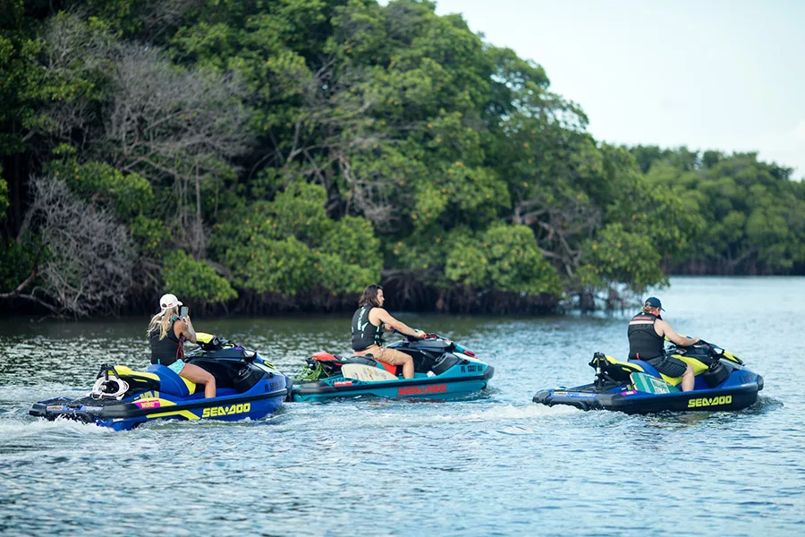 three-people-riding-jet-skis-jpg Donut boat on Lake Austin