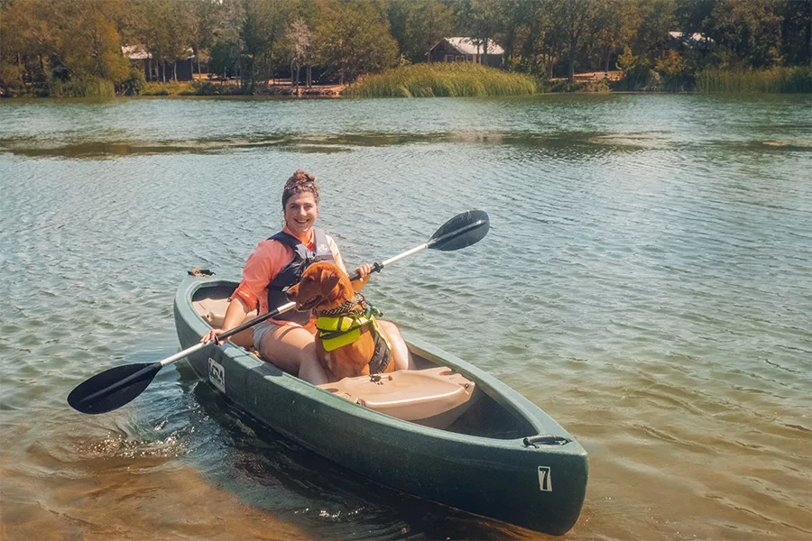 woman canoeing with dog jpg